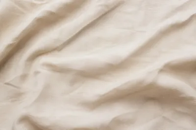 Softly Wrinkled Natural Linen Fabric Background