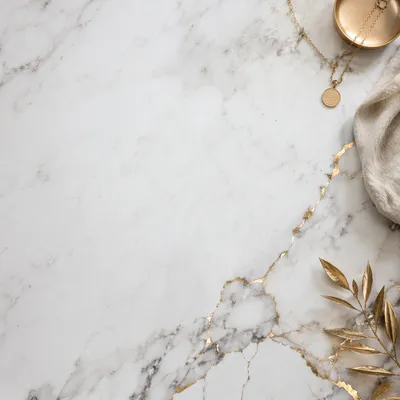 White Marble Background with Gold Accents