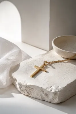 Minimalist Gold Cross on White Pedestal