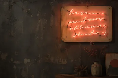 Coral Neon Motivation on Dark Concrete Wall