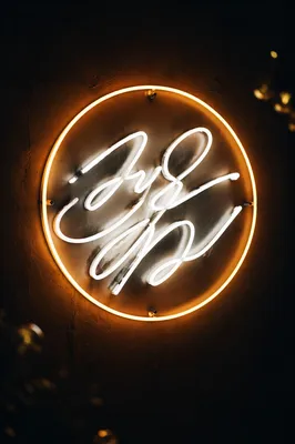 Amber Neon Motivation Sign on Charcoal Wall