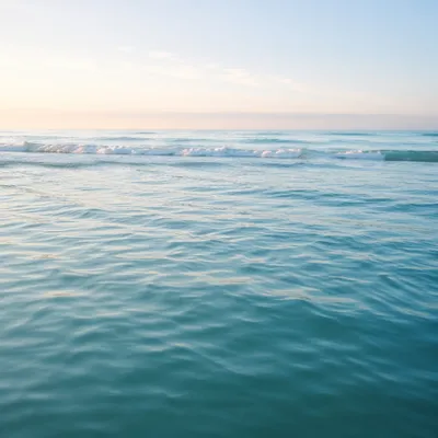 Calm Blue Ocean Waves at Dawn
