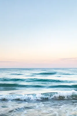 Calm Blue Ocean Waves at Dawn