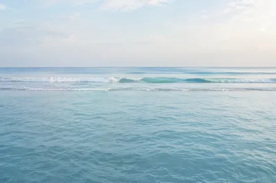 Calm Blue Ocean Waves at Dawn