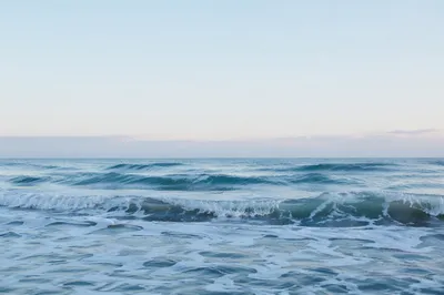 Calm Blue Ocean Waves at Dawn