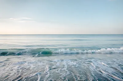 Calm Blue Ocean Waves at Dawn