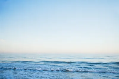 Calm Blue Ocean Waves at Dawn
