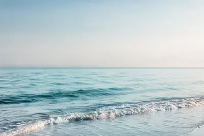 Calm Blue Ocean Waves at Dawn
