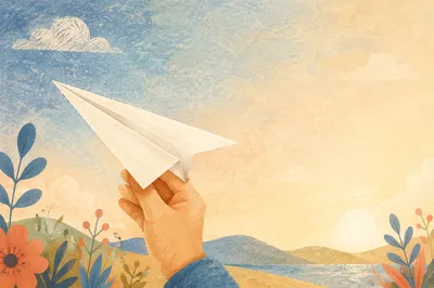 Hand Holding Paper Airplane in Pastel Light