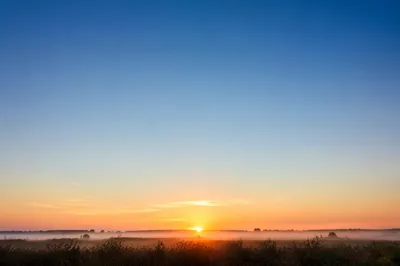 Calm Sunrise Horizon with Spacious Sky