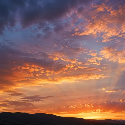 Dramatic Sunset Sky Over Distant Hills