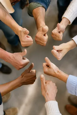 Diverse Hands Giving Thumbs Up Circle