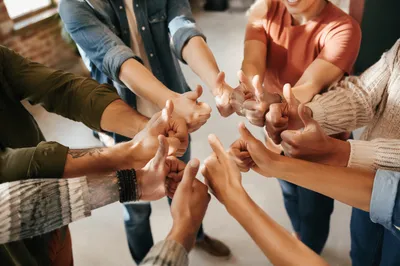 Diverse Group Giving Thumbs Up