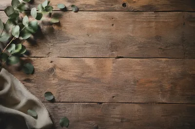 Rustic Wooden Tabletop with Eucalyptus Leaves