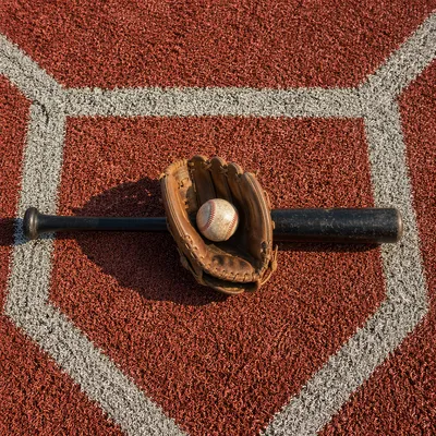 Baseball Gear on Home Plate Diamond