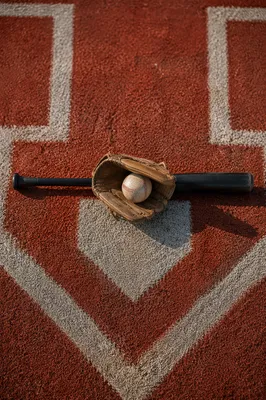 Baseball Gear on Home Plate Field
