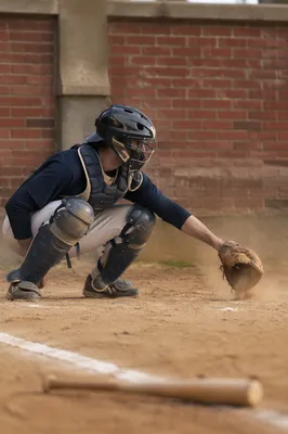 Baseball Catcher on Dusty Diamond Field