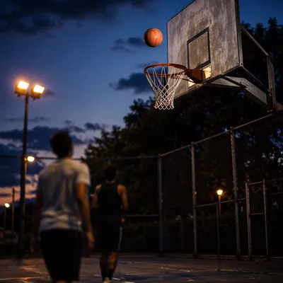 Blue Hour Basketball Hoop on Outdoor Court
