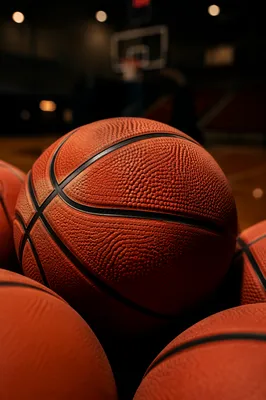 Basketballs in Dim Indoor Gym