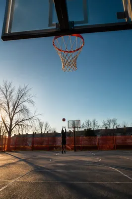 Sunny Neighborhood Basketball Court Jump Shot