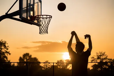 Golden Hour Basketball Jump Shot Silhouette