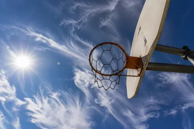 Outdoor Basketball Hoop Under Blue Sky