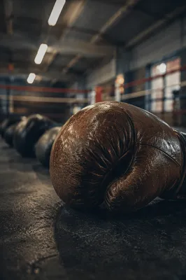 Worn Boxing Gloves in Training Ring