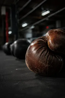 Worn Boxing Gloves in Training Ring
