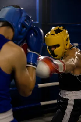 Intense Boxing Sparring in Gym Ring