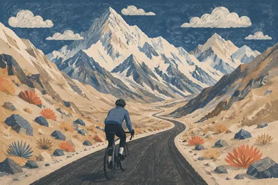 Lone Cyclist Climbing Mountain Road