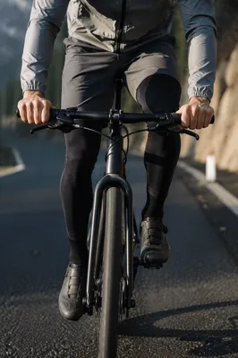 Mountain Road Cyclist in Morning Light