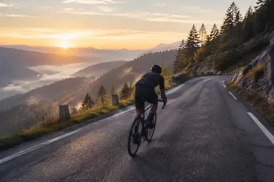 Mountain Road Cyclist at Sunrise