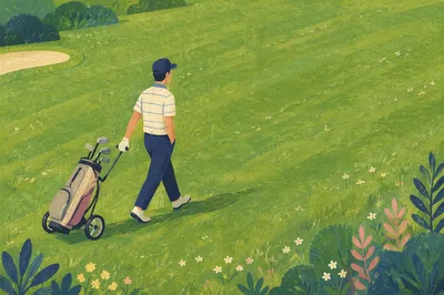 Solitary Golfer Walking Across Emerald Fairway