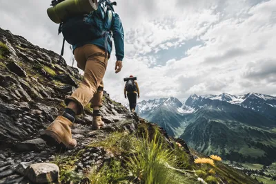 Hikers Ascending Rocky Mountain Trail