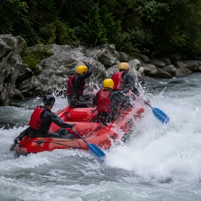 White Water Rafting Through Forest Rapids