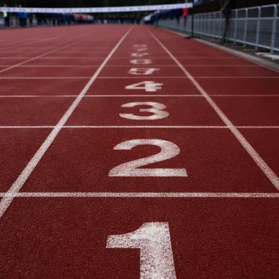 Empty Marathon Finish Line on Red Track