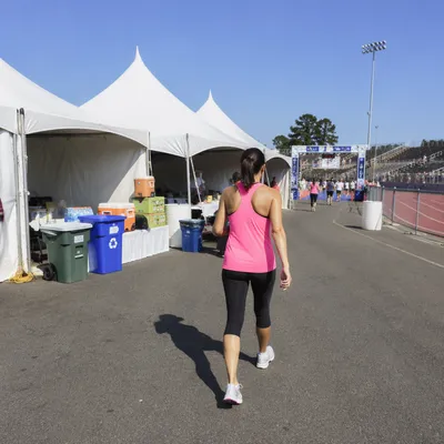Marathon Finish Area With Female Runner