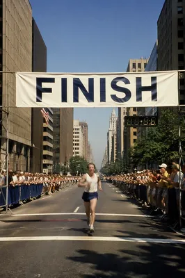 Exhausted Runner Near City Marathon Finish