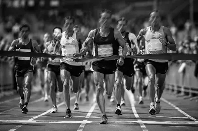 Marathon Runners Sprinting Toward Finish Line