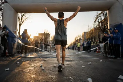 Hopeful Marathon Runner Crossing Finish Line