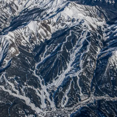Aerial Winter Mountain Ski Resort Terrain