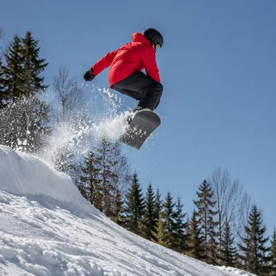 Winter Sports Rider Jumping Snowy Mountain Ridge