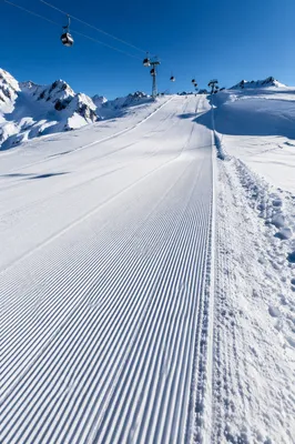 Fresh Groomed Alpine Downhill Ski Slope