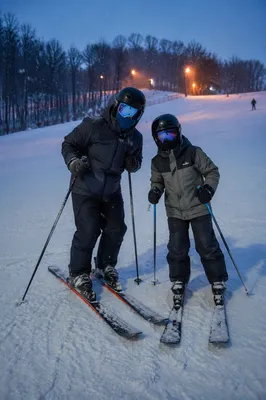 Downhill Skiers at Blue Hour Dusk