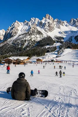 Busy Alpine Ski Resort Under Winter Sun