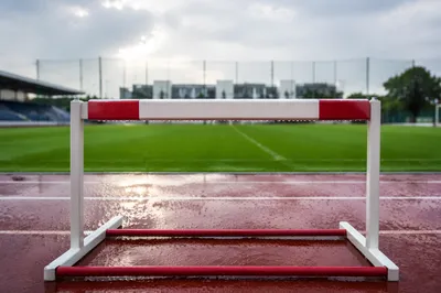 Training Hurdle on Wet Soccer Field