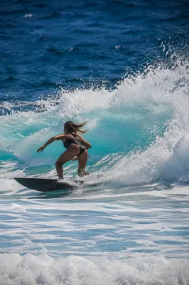 Surfer Riding Powerful Blue Ocean Wave