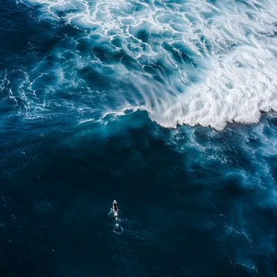 Aerial Summer Surfer in Turquoise Waves