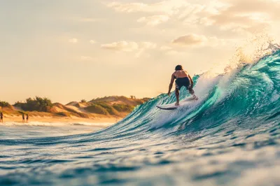 Golden Hour Surfer on Turquoise Wave