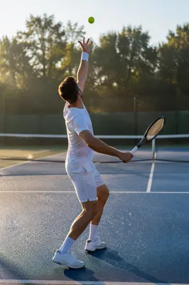 Early Morning Tennis Serve on Court